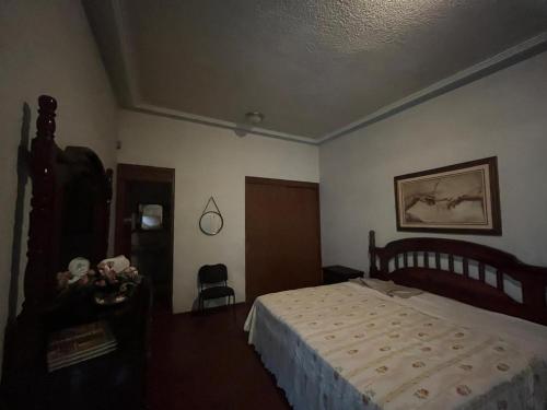 A bed or beds in a room at Misión Vizcaya Hospedaje
