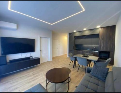 TV a/nebo společenská místnost v ubytování Holiday Apartments