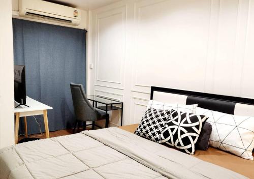 Llit o llits en una habitació de R1 House,bts,Mega Bangna,night market,Suvarnabhumi