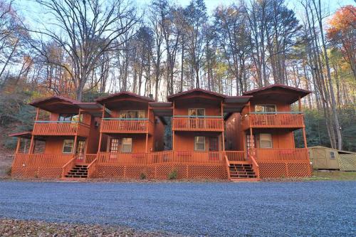 a building with balconies on the side of it at Mountain Cabin in woods 3 minutes to Helen #13 in Helen