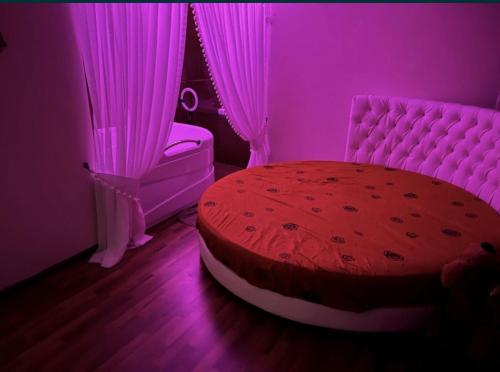Een bed of bedden in een kamer bij vila padrino