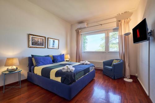Giường trong phòng chung tại [Hotel Cavalieri]Vista incredibile - A/C e Netflix