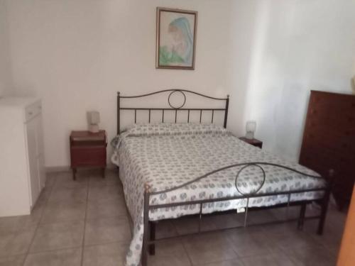 Ein Bett oder Betten in einem Zimmer der Unterkunft Casa Via Marco polo