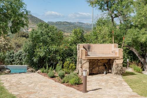 a stoneificialificialificialificialificialificialificialificialificialificialificialificialificialificial at Villa Aromata in Trudda