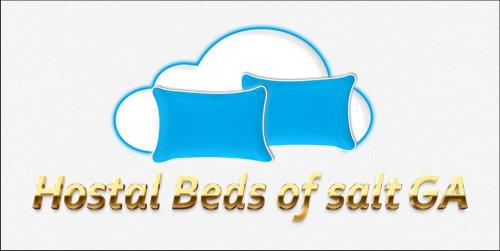 un logo per i letti ospedalieri di Salt ga di salt beds of salt hostal a Uyuni