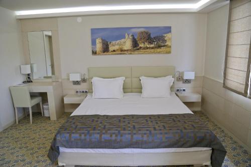Postel nebo postele na pokoji v ubytování Hotel Svilena