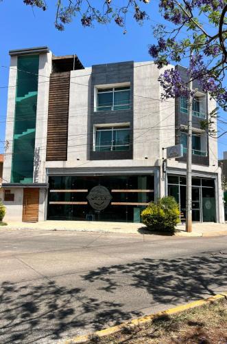 a building on the side of a street at Hotel Boutique Blue Diamond in Tepatitlán de Morelos