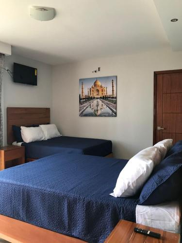 Krevet ili kreveti u jedinici u okviru objekta Hotel Boutique Blue Diamond