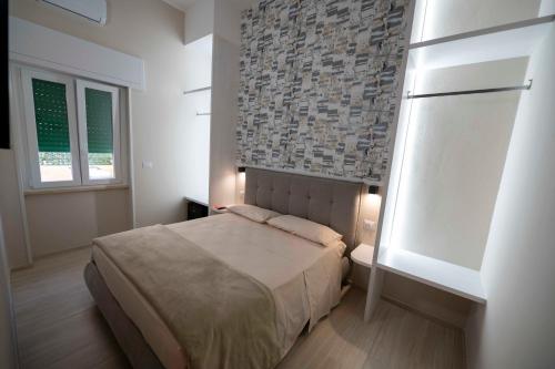 Postel nebo postele na pokoji v ubytování TERESITA Guest House