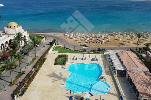 an aerial view of the beach and the ocean at Apartment with private Beach in Sahl Hasheesh in Hurghada