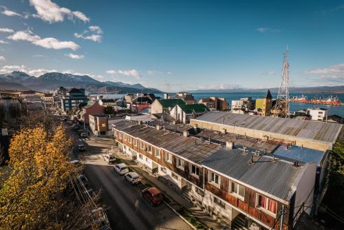 an aerial view of a city with buildings and a street at Gente del Sur - Urbano Centro in Ushuaia