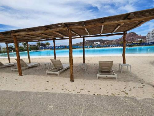 Πισίνα στο ή κοντά στο Mazatlán Bluu Condominio de Lujo con Laguna