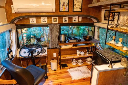 an interior view of an rv with a steering wheel at Boutique Bangalôs De São Chico in São Francisco de Paula