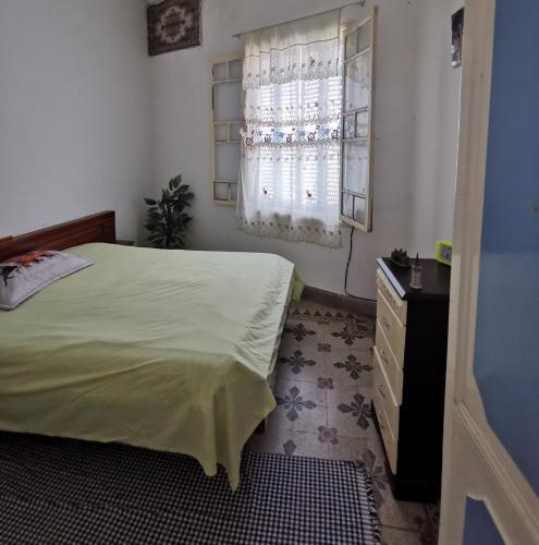 Katil atau katil-katil dalam bilik di Dar Mima Baya