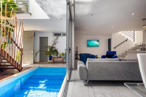 Πισίνα στο ή κοντά στο Casa Moderna en Playa Norte Isla Mujeres