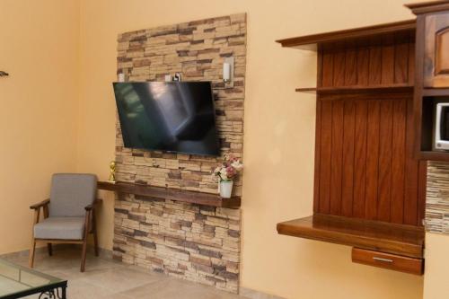 TV a/nebo společenská místnost v ubytování Casa SHALOM