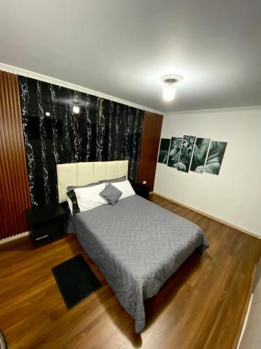 Postel nebo postele na pokoji v ubytování Hotel Canela 96