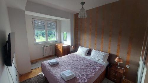 Postel nebo postele na pokoji v ubytování T&D Apartment