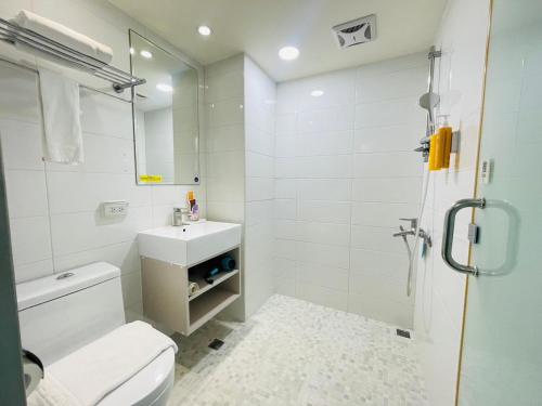 Koupelna v ubytování Hotel Leisure 台中輕行旅