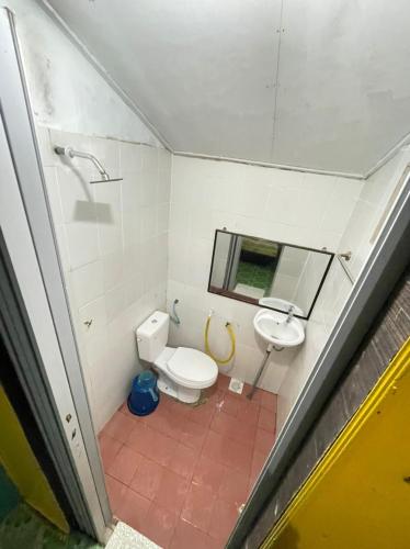 a bathroom with a toilet and a sink at B'first Chalet Perhentian Island in Kuala Besut