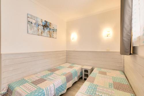 Postel nebo postele na pokoji v ubytování Les Bastides aux Restanques du Golfe de St Tropez - Maeva Home - Appartement 34