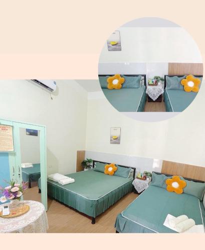 a hospital room with two beds and a mirror at Pra-Ha Villa in Tam Ðảo