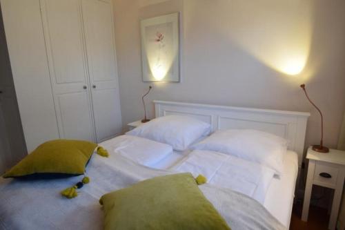 Tempat tidur dalam kamar di Bomhoffstr. 22, W6, GB6