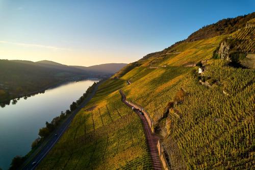 an aerial view of a river and a road at Sonnenuhr in Bernkastel-Kues