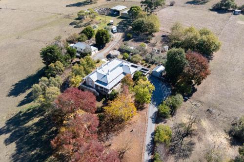 an aerial view of a large house with trees at Mt Barker Nina's 2BR Cottage in Mount Barker