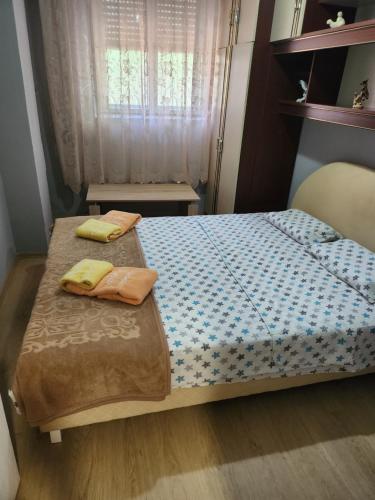Postel nebo postele na pokoji v ubytování Apartman DUNJA