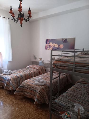 Postel nebo postele na pokoji v ubytování locazione Lety
