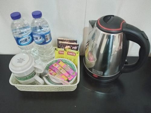 Παροχές για τσάι/καφέ στο Urbanview Hotel Rifal Home Tegal