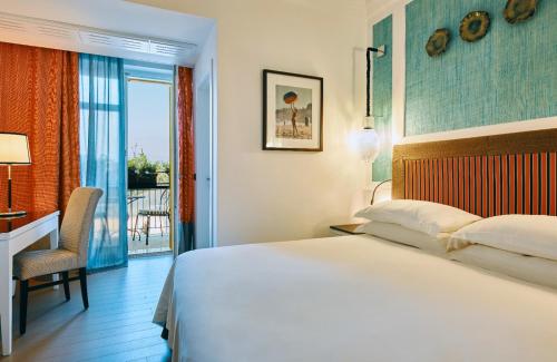 Postel nebo postele na pokoji v ubytování Boutique Hotel Esplanade