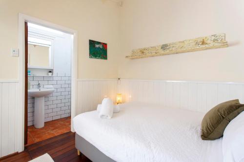 Ένα ή περισσότερα κρεβάτια σε δωμάτιο στο South Freo Hideaway