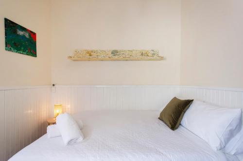 Ένα ή περισσότερα κρεβάτια σε δωμάτιο στο South Freo Hideaway