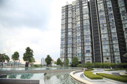 a rendering of a large apartment building with a fountain at Cozy Hyve Soho Sky View With Wifi Netflix & Parkin 116 in Cyberjaya