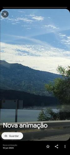 a view of a mountain and a lake from a car at Rural Estation vía puy du fou in Gerindote