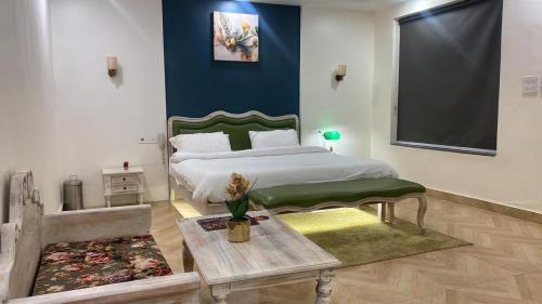 מיטה או מיטות בחדר ב-Marbella Resort