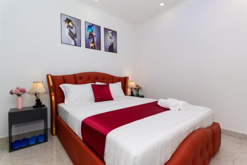Postel nebo postele na pokoji v ubytování Hotel Eros - Phan Huy Ích