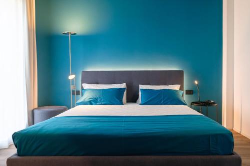 Postel nebo postele na pokoji v ubytování Camoma Aparthotel - Suites Apartments