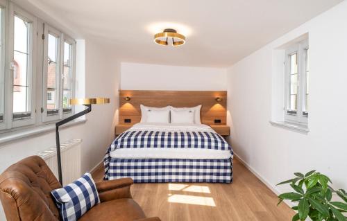 Una cama o camas en una habitación de Hästens Ferienhaus "Maison Eveline" - chez Douverne