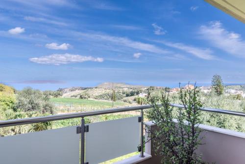 a balcony with a view of the desert at Vacation House close to the Beach in Elia