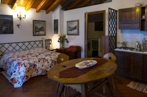 A bed or beds in a room at La Residence da Caterina