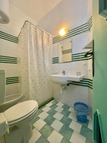 a bathroom with a toilet and a sink at B&B Giardini di Iside e Osiride in Casamicciola Terme