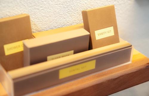 a bunch of boxes sitting on a shelf at Melianthos Villas in Vathi, Sifnos