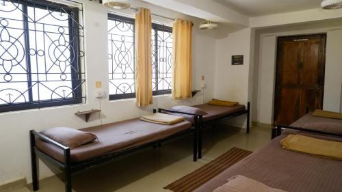 Una cama o camas en una habitación de BunkNBrew