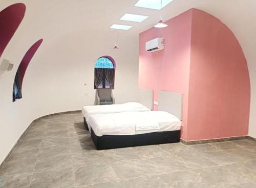 Un ou plusieurs lits dans un hébergement de l'établissement Mamee Dome Villa Best Homestay