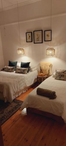 Кровать или кровати в номере Harry's Place Guesthouse