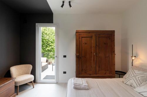 Postel nebo postele na pokoji v ubytování Memento B&B