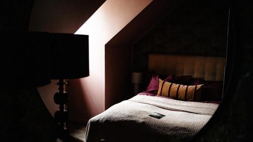 A bed or beds in a room at The Norrmans Castle